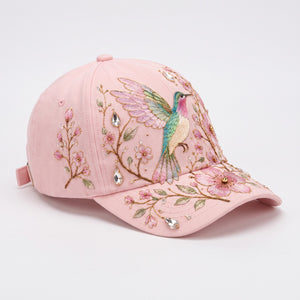 Rosa basebollkeps med broderad kolibri och körsbärsblommor
